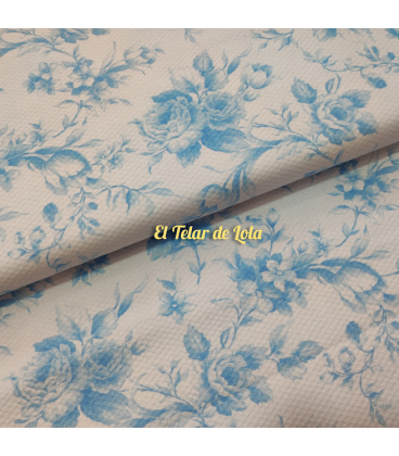 PIQUE NIDO ESTAMPADO FLORES CELESTE